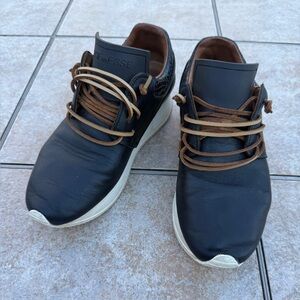 ESSEutESSE black leather sneakers